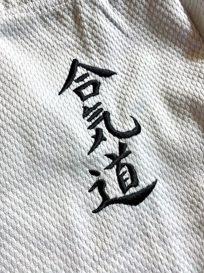 Combinaison d'Aïkido spéciale avec broderie - blanche - 450 g - Veste d'Aïkido brodée - personnages - Tissu robuste