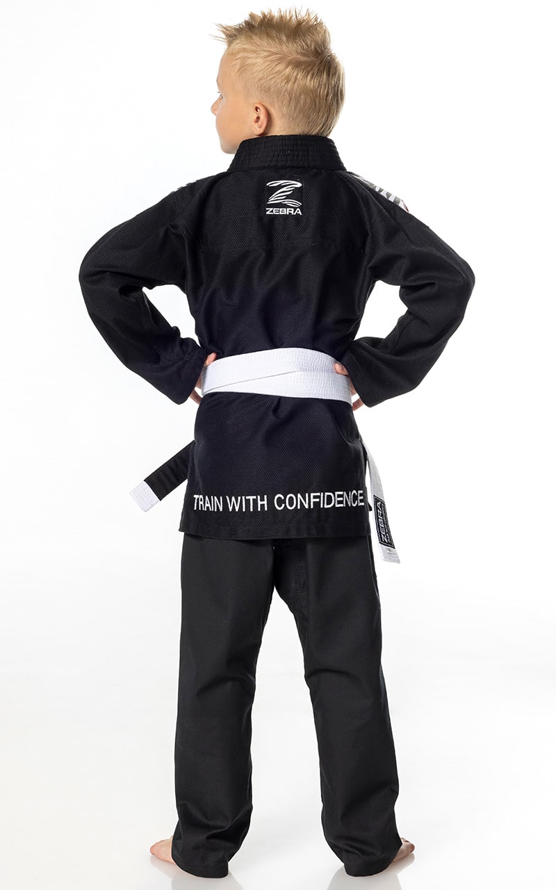 Combinaison de jiu-jitsu brésilien ZEBRA pour enfant, noire, avec veste, pantalon et ceinture blanche.